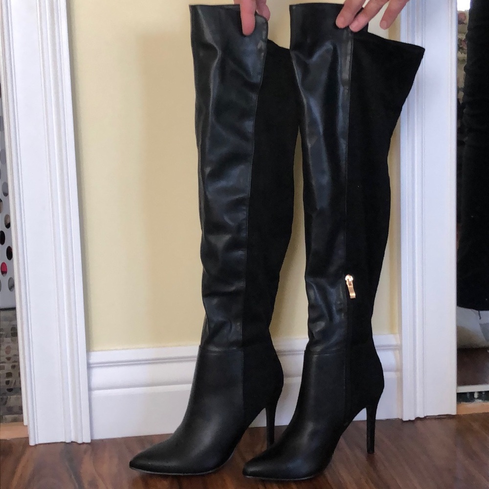 Black satin/velvet high heel boots.